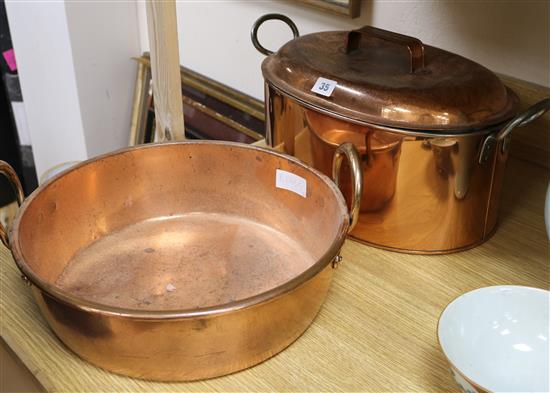 An iron handled oval copper pan and cover, and a preserve pan